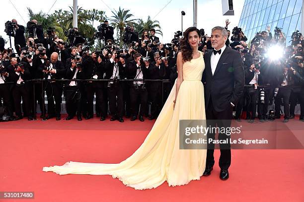 Actor George Clooney and his wife Amal Clooney attend the "Money Monster" premiere during the 69th annual Cannes Film Festival at the Palais des...