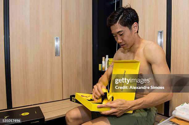 Shinji Kagawa of Borussia Dortmund revealing the new Borussia Dortmund home jersey, Season 2016-2017 on May 12, 2016 in Dortmund, Germany.