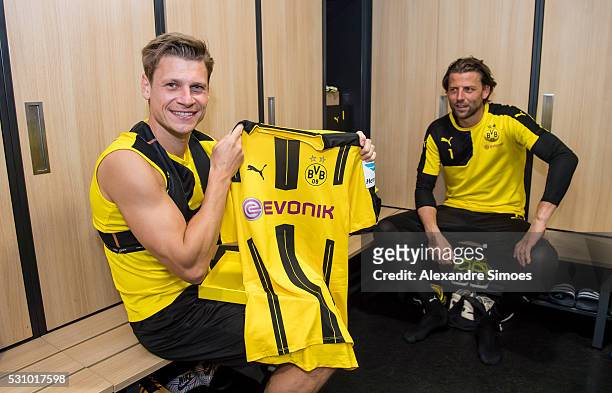 Lukasz Piszczek of Borussia Dortmund revealing the new Borussia Dortmund home jersey, Season 2016-2017 on May 12, 2016 in Dortmund, Germany.