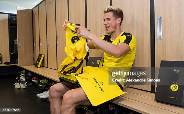 Erik Durm of Borussia Dortmund revealing the new Borussia Dortmund home jersey, Season 2016-2017 on May 12, 2016 in Dortmund, Germany.