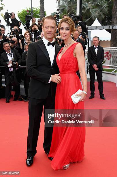 Rocco Siffredi and Rozsa Tassi attend the "Money Monster" premiere during the 69th annual Cannes Film Festival at the Palais des Festivals on May 12,...