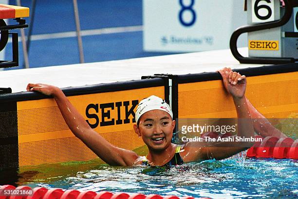 Kyoko Iwasaki of Japan celebrates winning the gold in the Women's 200m Breaststroke during the Barcelona Summer Olympic Games at Piscines Bernat...