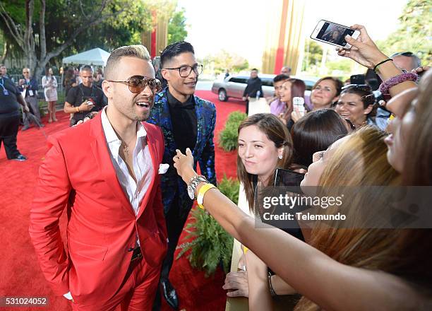 Red Carpet -- Pictured: Chino & Nacho arrive at the 2014 Billboard Latin Music Awards, from Miami, Florida at the BankUnited Center, University of...