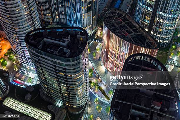 close up of sanlitun soho at night - beijing city photos et images de collection