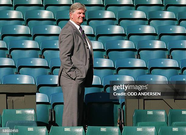 London, UNITED KINGDOM: Tournament referee Alan Mills inspects Centre court at Wimbledon tennis ground in London, 19 June, 2005. Mills, the...