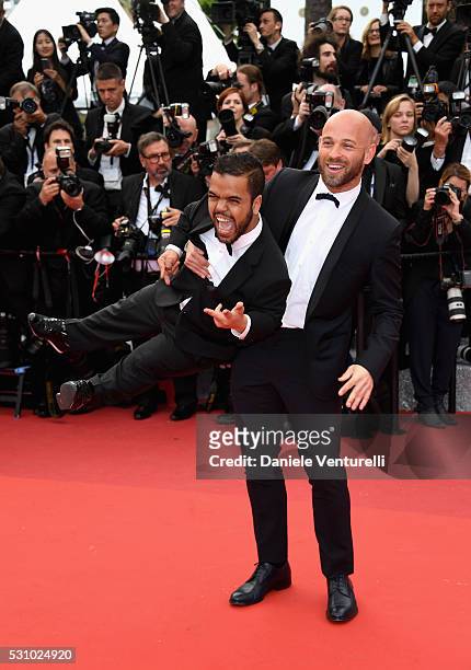 Actor Franck Gastambide and guest attends the "Money Monster" premiere during the 69th annual Cannes Film Festival at the Palais des Festivals on May...