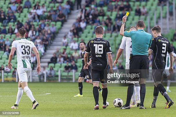 Fc Groningen - Heracles Almelo. Hans Hateboer of FC Groningen, gele kaart, Heracles Almelo speler Ramon Zomer, scheidsrechter Ed Janssen, during the...