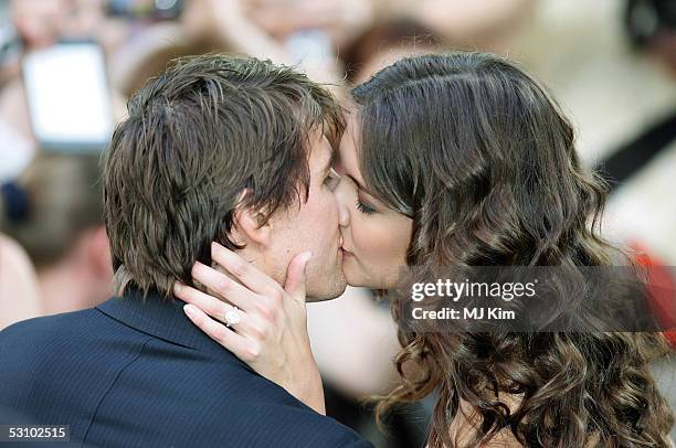 Actor Tom Cruise and acterss Katie Holmes kiss as they arrive at the UK premiere of "War Of The Worlds" at the Odeon Leicester Square June 19, 2005...