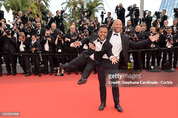 Actor Franck Gastambide and guest attend the "Money Monster" premiere during the 69th annual Cannes Film Festival at the Palais des Festivals on May...