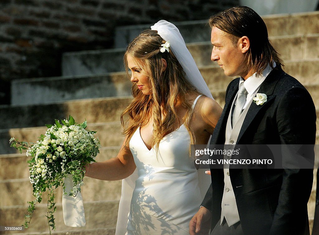 AS Roma captain Francesco Totti (R) smil