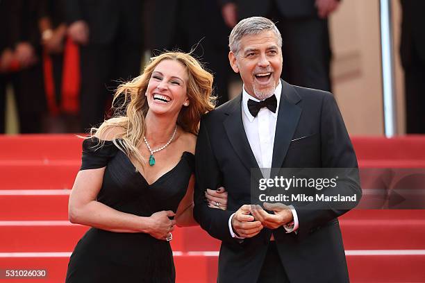 Julia Roberts and George Clooney attend the 'Money Monster' premiere during the 69th annual Cannes Film Festival at the Palais des Festivals on May...