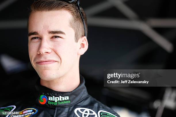 Ben Rhodes, driver of the Carolina Nut Co. Toyota, practices for the NASCAR Camping World Truck Series at Dover International Speedway on May 12,...