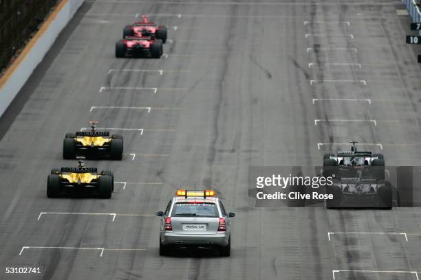 Six cars line up for the start of the United States F1 Grand Prix at the Indianapolis Motor Speedway on June 19, 2005 in Indianapolis, Indiana.