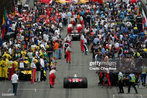 Jarno Trulli of Italy and Toyota joins the grid for the start of the United States F1 Grand Prix at the Indianapolis Motor Speedway on June 19, 2005...