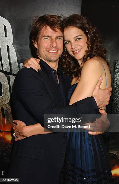 Tom Cruise and Katie Holmes arrive for the UK Premiere of Tom Cruise's new blockbuster "War Of The Worlds" at the Odeon Leicester Square on June 19,...