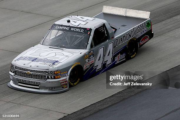 Tommy Joe Martins, driver of the Diamond Gusset Jeans/M.Tech Control Chevrolet, practices for the NASCAR Camping World Truck Series at Dover...