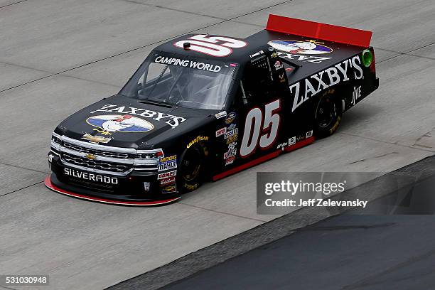 John Wes Townley, driver of the Zaxby's Chevrolet, practices for the NASCAR Camping World Truck Series at Dover International Speedway on May 12,...