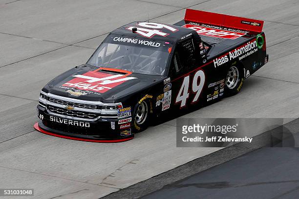 Nick Drake, driver of the Haas Automation Chevrolet, practices for the NASCAR Camping World Truck Series at Dover International Speedway on May 12,...