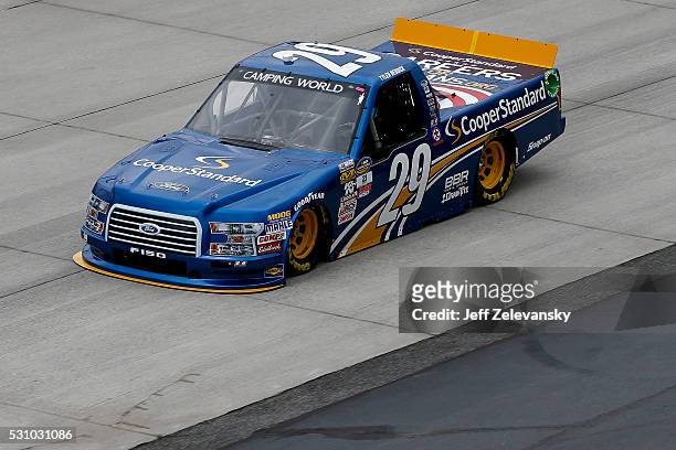 Tyler Reddick, driver of the Cooper Standard Ford, practices for the NASCAR Camping World Truck Series at Dover International Speedway on May 12,...