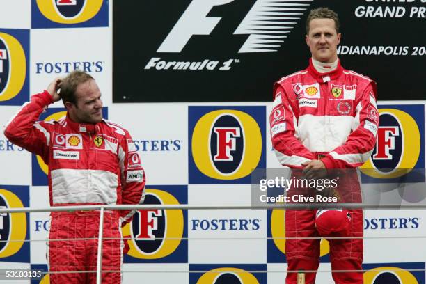 Michael Schumacher of Germany and Ferrari and Rubens Barrichello on the podium after the United States F1 Grand Prix at the Indianapolis Motor...