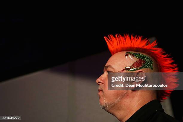 Peter Wright of Scotland looks on before he plays a shot in his match against Raymond van Barneveld of the Netherlands during the Darts Betway...
