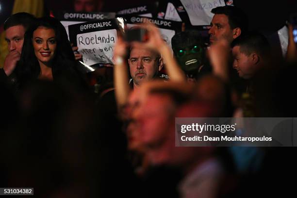 Peter Wright of Scotland looks on before he plays Raymond van Barneveld of the Netherlands during the Darts Betway Premier League Night 15 at...