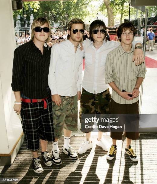 Members of band McFly Tom Fletcher, Harry Judd, Danny Jones and Dougie Poynter arrive for the UK premiere of Tom Cruise's new movie "War Of The...