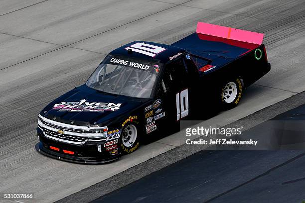 Jennifer Jo Cobb, driver of the Driven2Honor.org Chevrolet, practices for the NASCAR Camping World Truck Series at Dover International Speedway on...