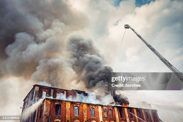 firefighting - building damage stockfoto's en -beelden