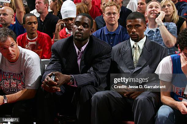 Chris Webber of the Philadelphia 76ers and Jalen Rose of the Toronto Raptors attend Game Five of the 2005 NBA Finals between the San Antonio Spurs...