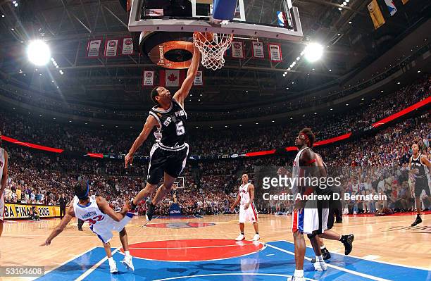 Robert Horry of the San Antonio Spurs dunks against Tayshaun Prince of the Detroit Pistons in Game five of the 2005 NBA Finals at the Palace of...
