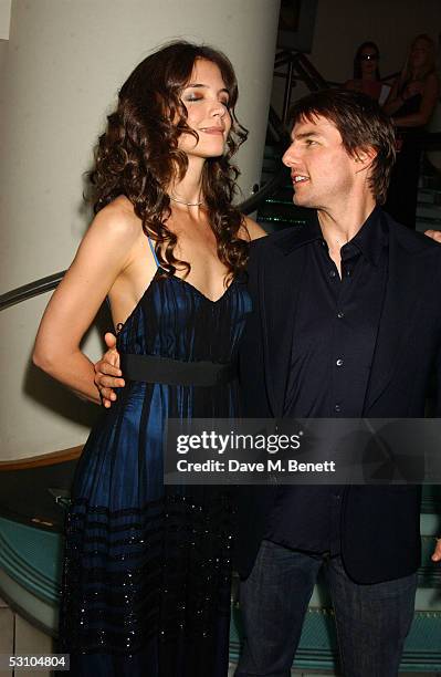 Actors Tom Cruise and his fiancee Katie Holmes arrive for the UK premiere of "War Of The Worlds" at the Odeon Leicester Square on June 19, 2005 in...