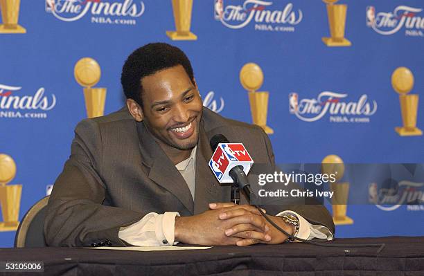 Robert Horry of the San Antonio Spurs smiles as he answers questions from the media during a post game press conference following Game Five of the...