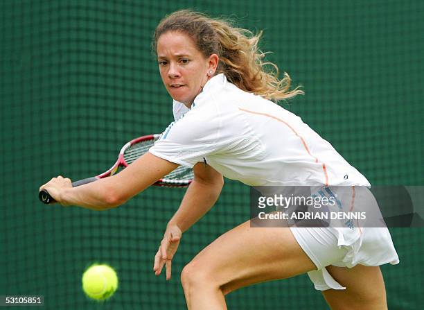 United Kingdom: Patty Schnyder Switzerland hits a shot to Antonella Serra Zanetti from Italy during their first round match at the 119th Wimbledon...