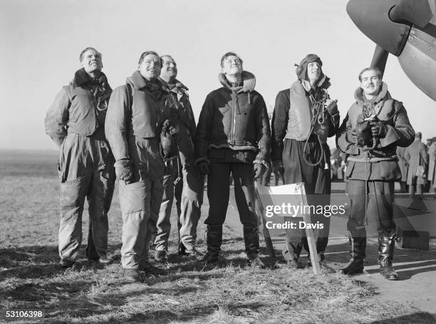 British pilots wait to take off from an RAF fighter command station in England during the Battle of Britain, World War II, 12th January 1940.