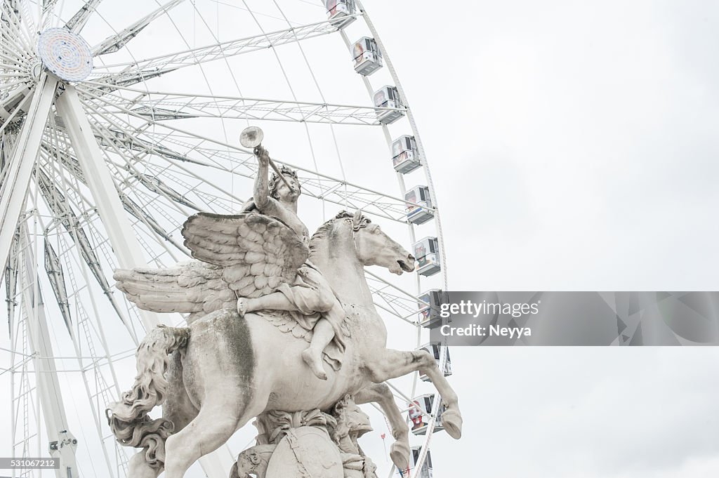 Ferris Wheel With Statue