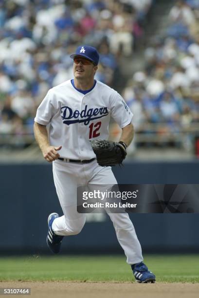 Jeff Kent of the Los Angeles Dodgers tracks a pop up during the game against the Minnesota Twins at Dodger Stadium on June 12, 2005 in Los Angeles,...