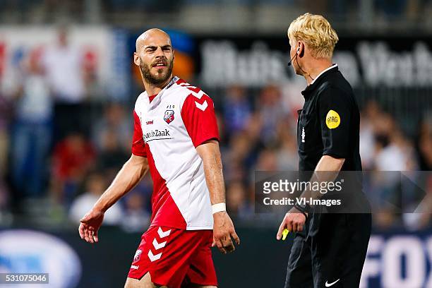 Ydllow card Ruud Boymans of FC Utrecht , referee Kevin Blom during the Europa League Play-offs match between PEC Zwolle and FC Utrecht at the...
