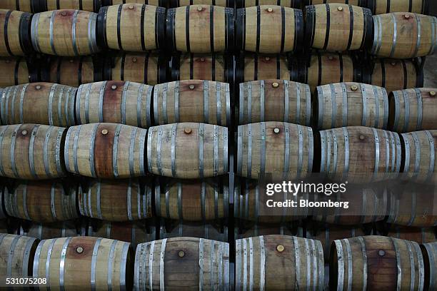 Barrels of wine sit stacked at the Diamond Estates Winery in Niagara-on-the-Lake, Ontario, Canada, on Friday, April 20, 2016. Ontario's wine exports...