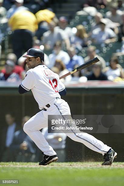 Alex Cora of the Cleveland Indians bats during the game against the Los Angeles Angels of Anaheim at Jacobs Field on May 18, 2005 in Cleveland, Ohio....