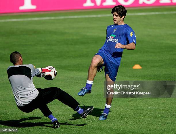 Juninho shots a against goalkeeper Dida during the Brazilian National Team training session for the FIFA Confederations Cup 2005 June 20, 2005 in...
