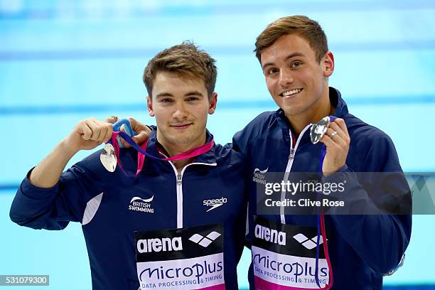 Daniel Goodfellow and Tom Daley of Great Britain pose with their silver medals afetr coming second in the Men's 10m Synchro Final on day four of the...