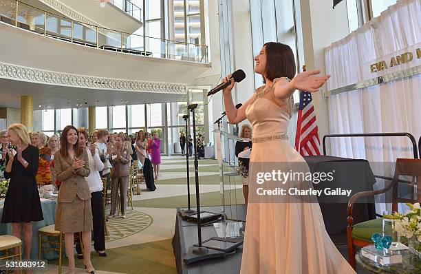 Singer Golda Berkman performs the National Anthem of The United States onstage during the Blue Ribbon of the Los Angeles Music Center to honor...