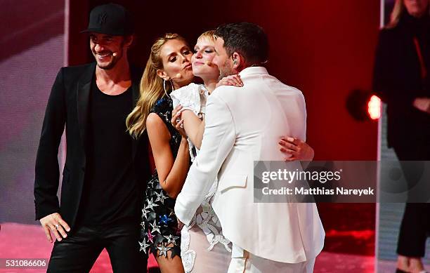 Kim Hnizdo, Thomas Hayo, Heidi Klum and Michael Michalsky celebrates being Germany's next topmodel during the finals of 'Germany's Next Topmodel' at...