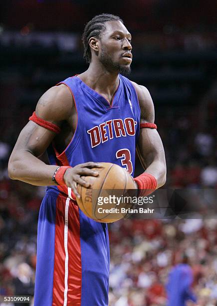 Ben Wallace of the Detroit Pistons looks to move the ball against the Miami Heat in Game Two of the Eastern Conference Finals during the 2005 NBA...