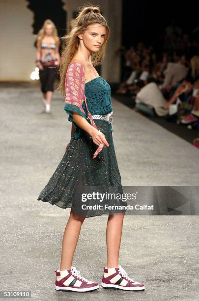 Model presents a design by Colcci during the Colcci Summer 2006 fashion show at Rio's Modern Art Museum during Rio Fashion Week on June 17, 2005 Rio...