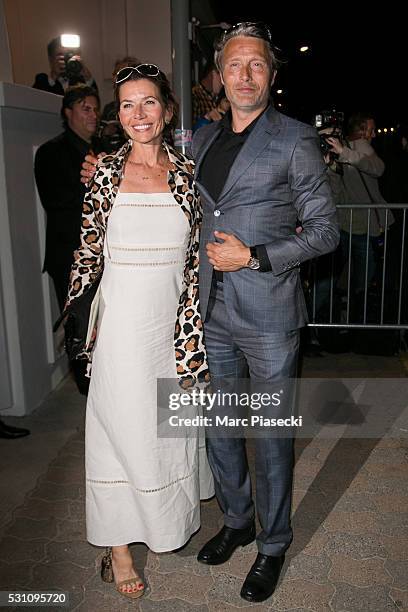 Hanne Jacobsen and Mads Mikkelsen arrive to attend the 'Vanity Fair and Chanel' party during the annual 69th Cannes Film Festival at 'Tetou'...