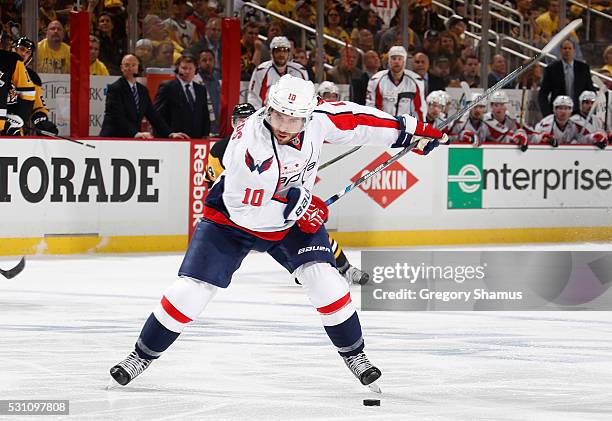 Mike Richards of the Washington Capitals takes a shot against the Pittsburgh Penguins in Game Six of the Eastern Conference Second Round during the...