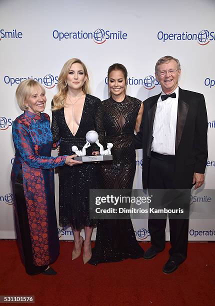 Universal Smile Award Recipient actress Kate Hudson and TV personality Brooke Burke-Charvet pose for a photo together with Operation Smile...