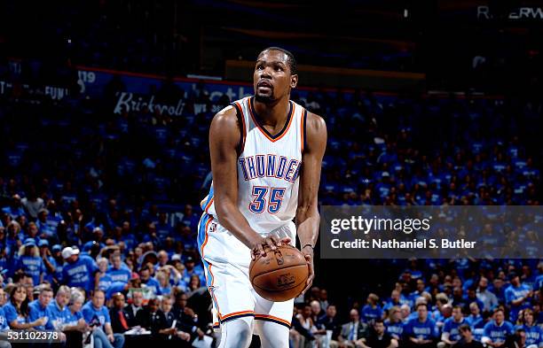 Kevin Durant of the Oklahoma City Thunder shoots a free throw against the San Antonio Spurs in Game Six of the Western Conference Semifinals during...
